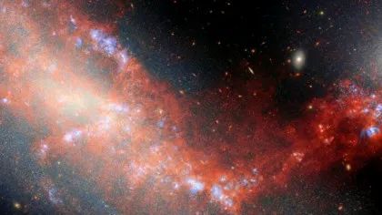 Telescopul Webb a descoperit un pod cosmic care leagă două galaxii pitice