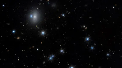 Telescopul Hubble a depistat o galaxie aproape invizibilă