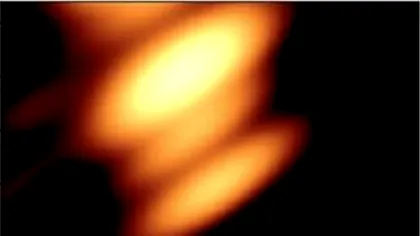 Pentru prima dată în istorie, astronomii au fotografiat două găuri negre care se orbitează una pe alta